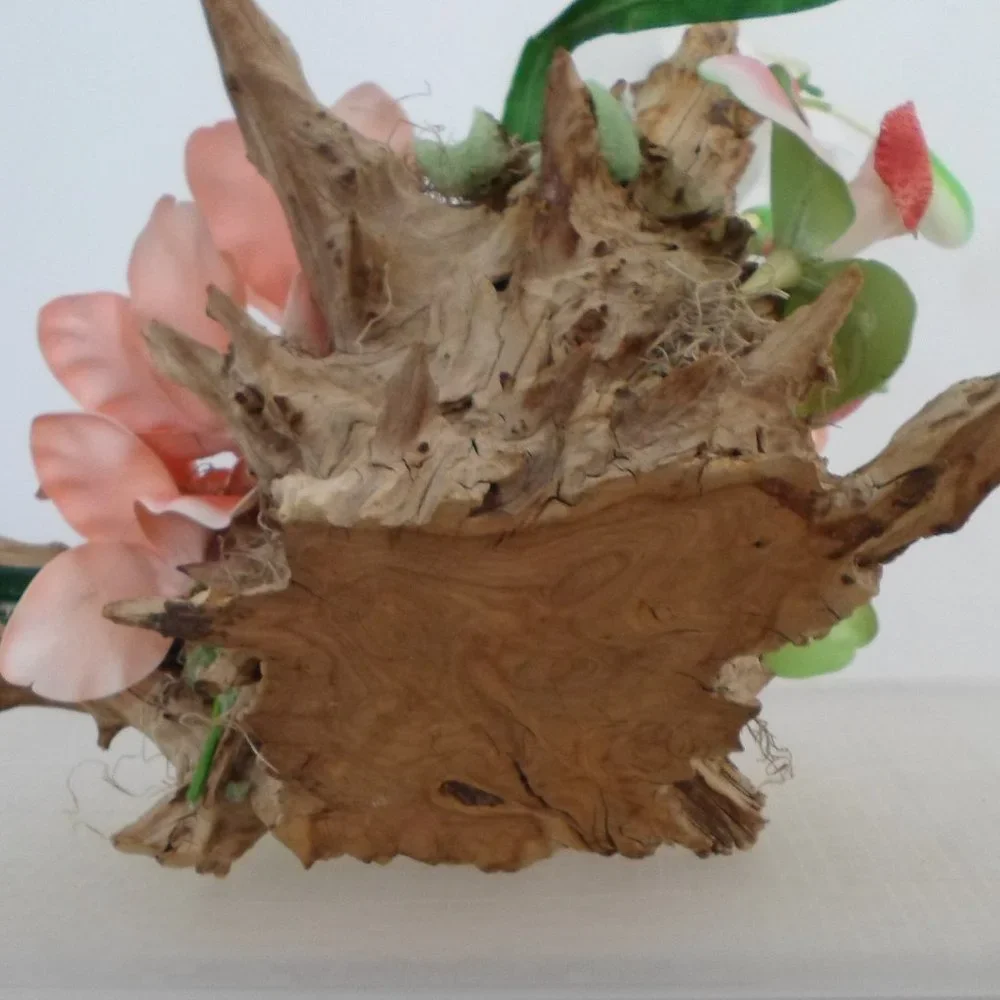 Fabric Orchids on a Tree Trunk Floral Arrangement